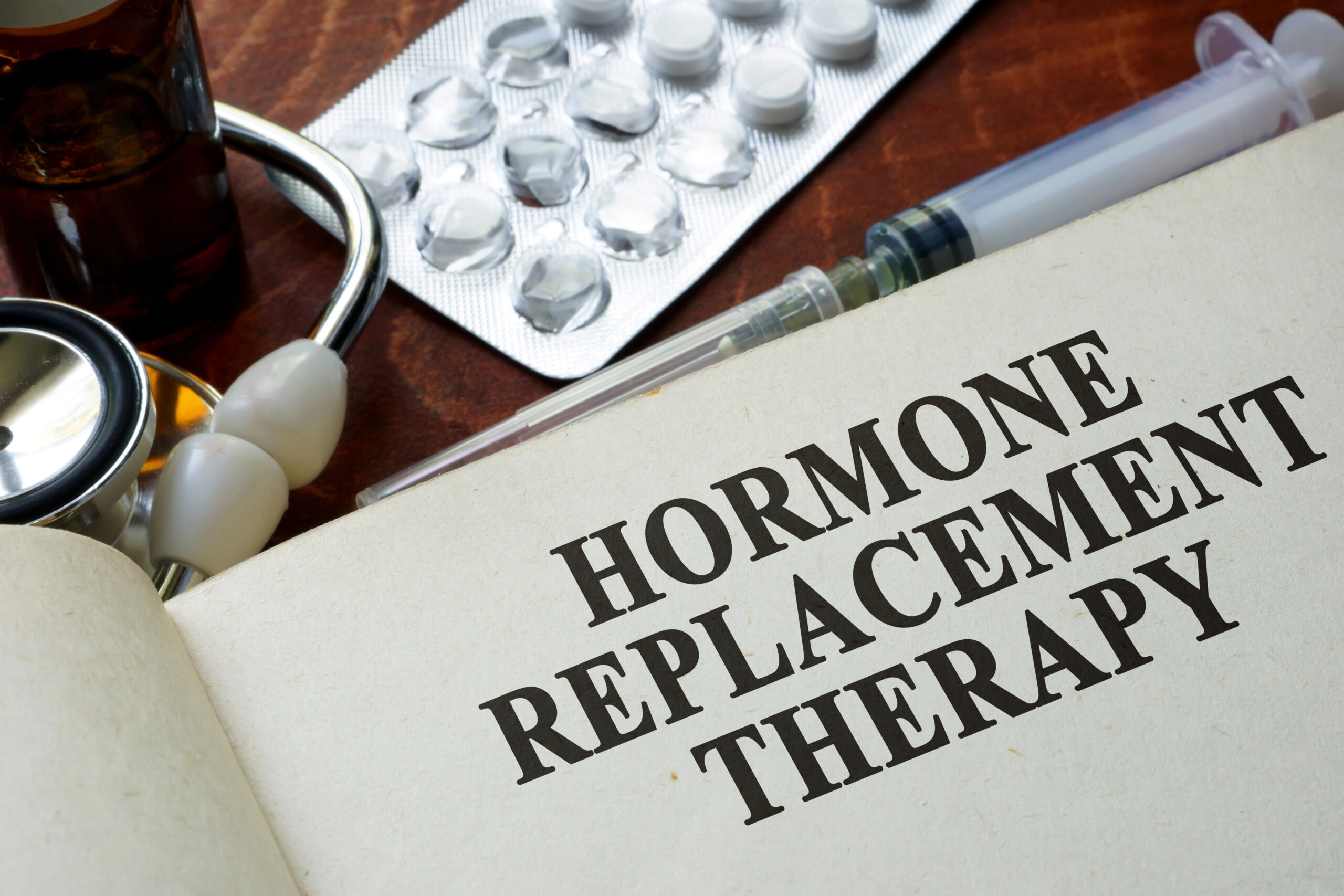 Couple smiling after personalized hormone wellness care at Clique Med Spa